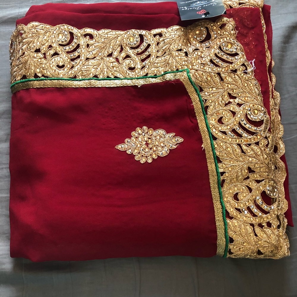 Red and gold saree